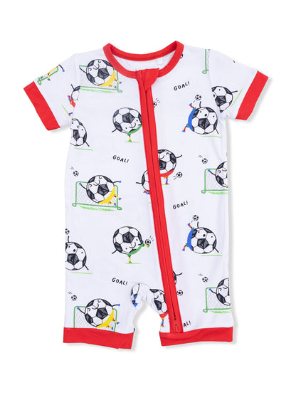 White baby romper with soccer ball prints and red trim, featuring playful "GOAL!" designs throughout.