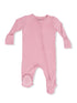 Pink long-sleeve onesie with a front zipper and polka dot accents on the feet. Ideal for infants and toddlers.