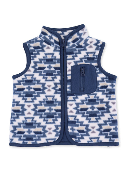 Navy and white fleece vest with geometric pattern and zip pocket, ideal for layering in cooler weather.