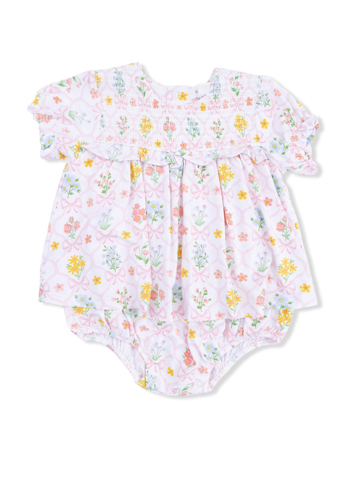Floral baby romper with pink background and colorful flowers, featuring smocked yoke and ruffled sleeves.