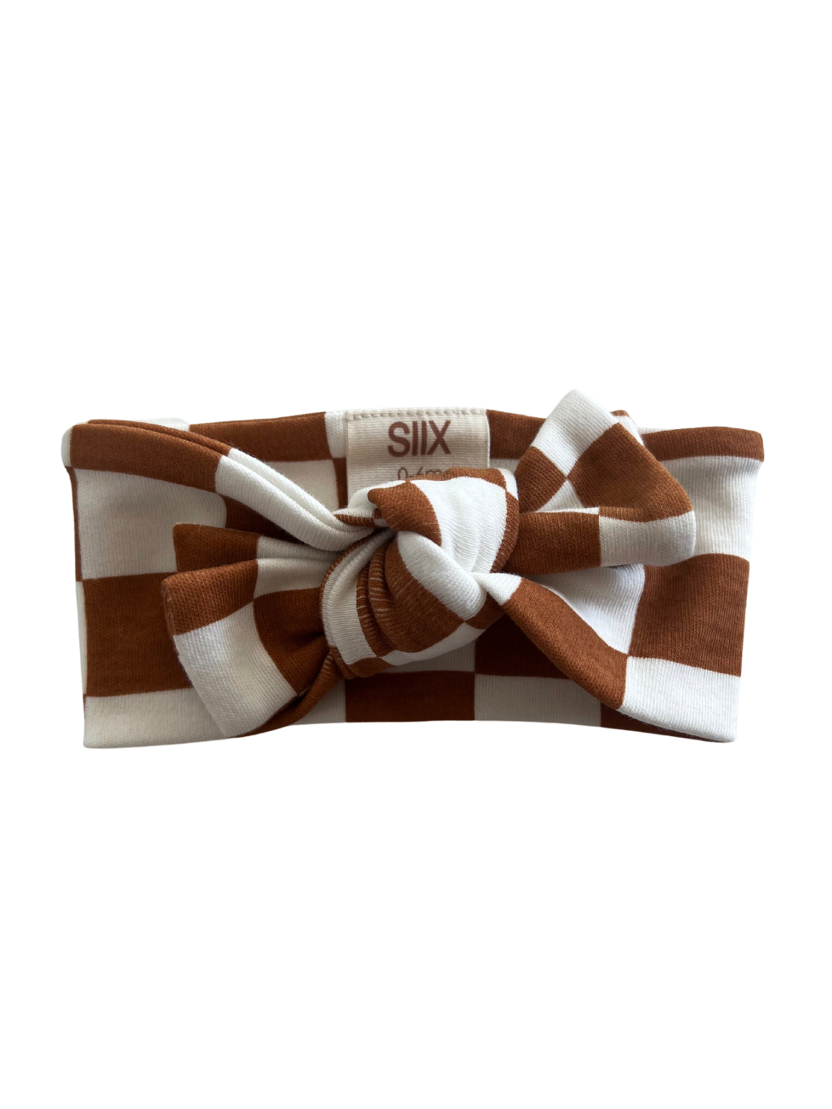 Brown and white checkered headband with a knot detail, displayed on a white background.