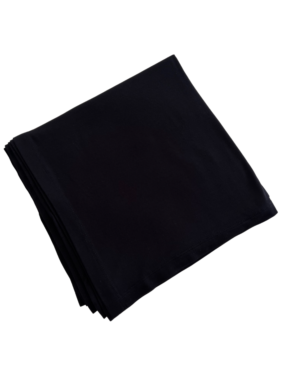 Black folded fabric cloth on a white background, showcasing a soft textile texture.