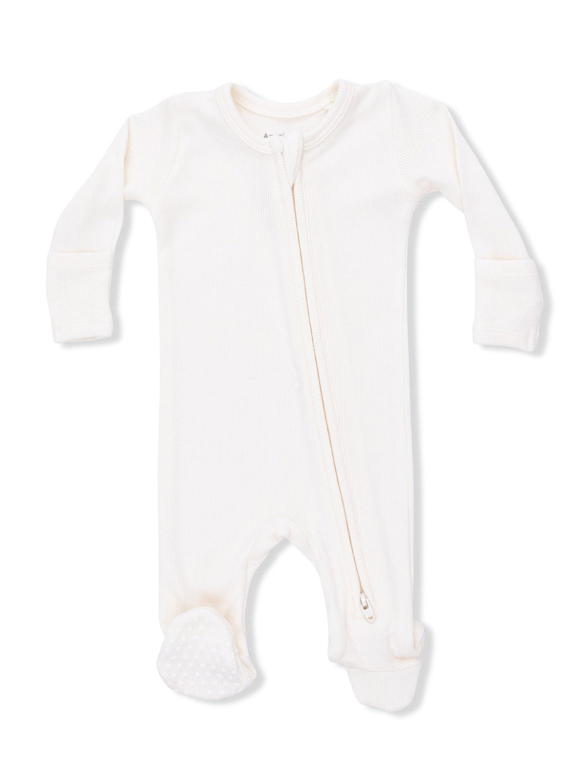 Cream-colored baby onesie with long sleeves and a front zipper, featuring textured feet for grip.