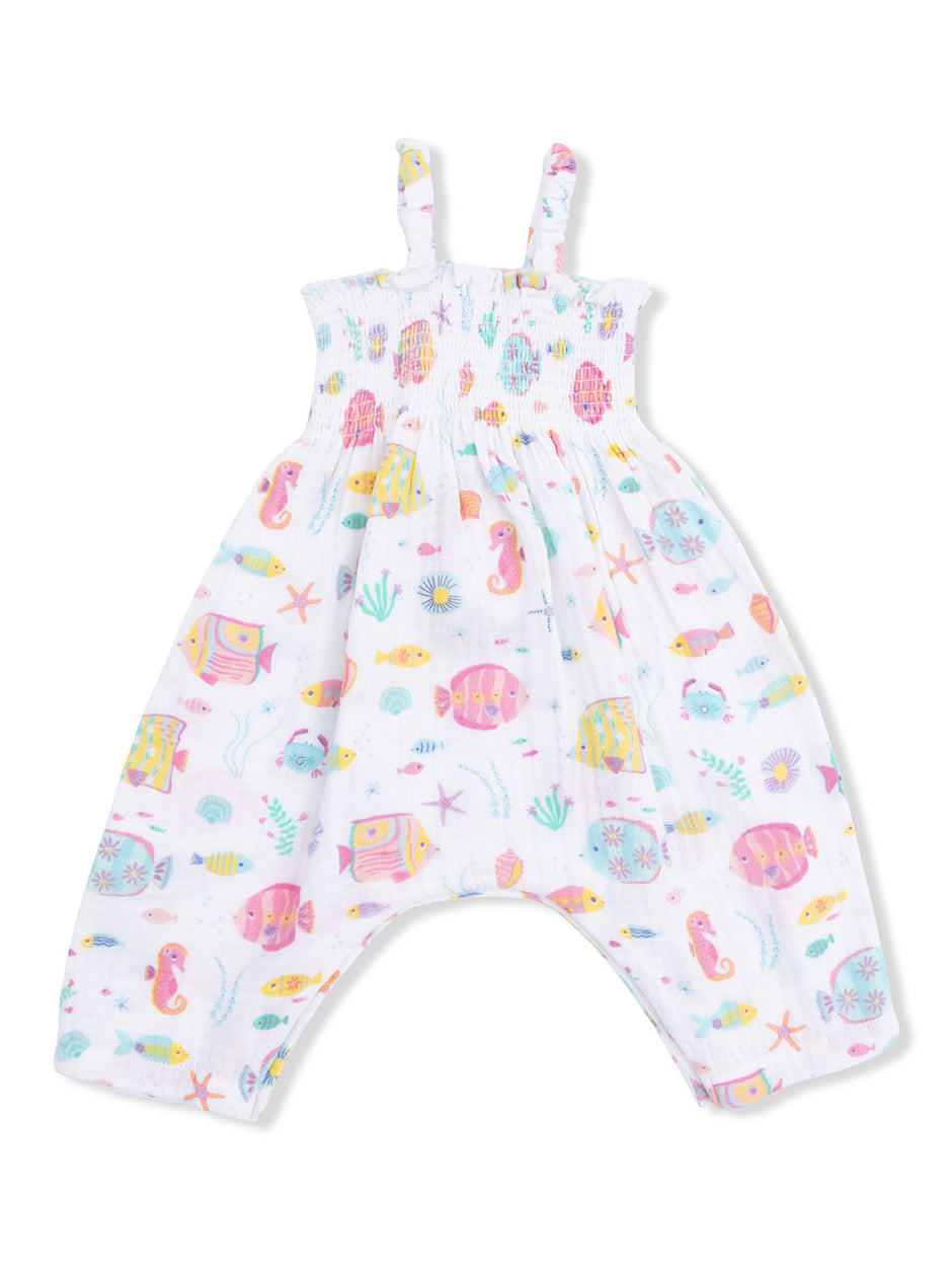 Girls' white romper with colorful sea-themed patterns, featuring fish, shells, and seahorses. Adjustable straps.