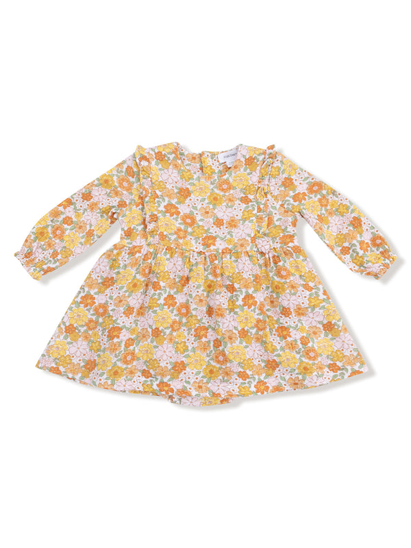 Floral patterned dress with long sleeves, featuring shades of orange, yellow, and pink on a light background.