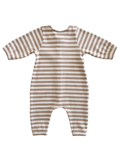 Tan and white striped long-sleeve baby romper, view from the back, featuring ribbed fabric.