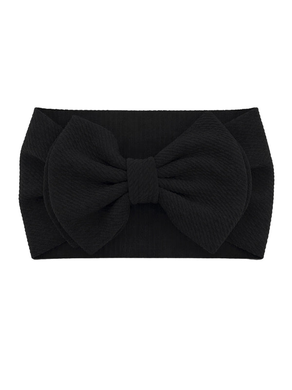 Black fabric headband with a large bow at the center, showcasing textured material. Ideal for stylish hair accessory.