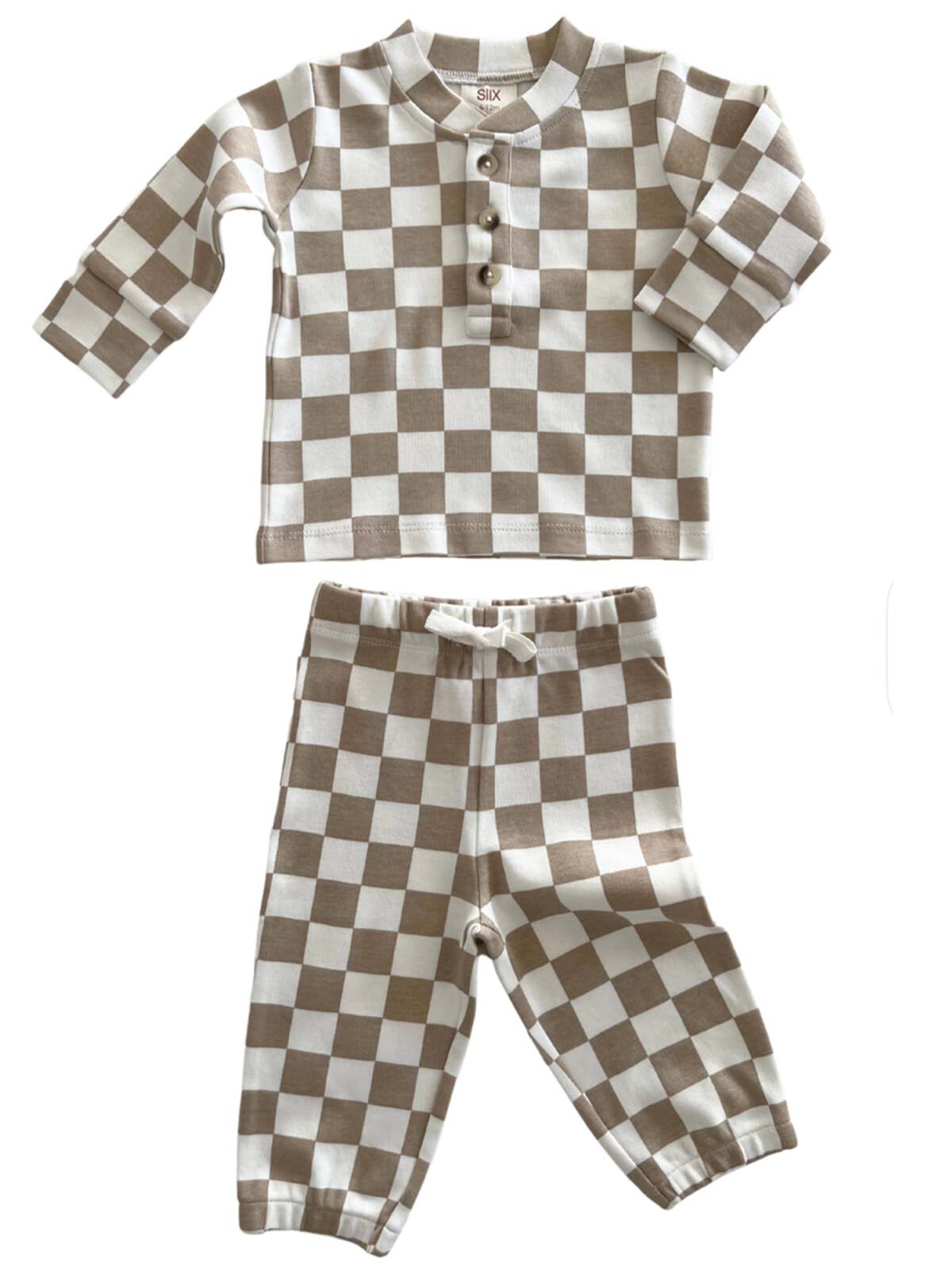 Brown and white checkered baby outfit with long-sleeve top and matching pants. Suitable for cozy wear.