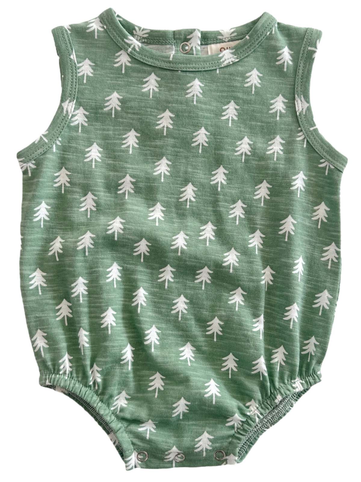 Green baby onesie with a pattern of white trees on a soft fabric, featuring snap closures at the bottom.