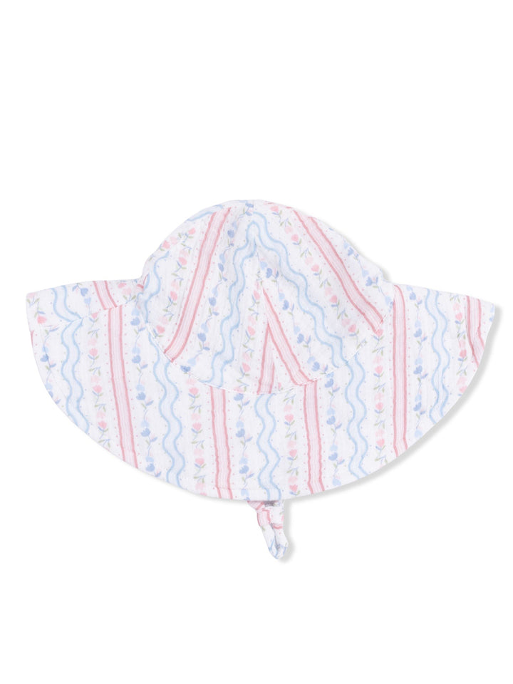 White sun hat with pink and blue floral stripes, featuring a wide brim and a adjustable chin strap.
