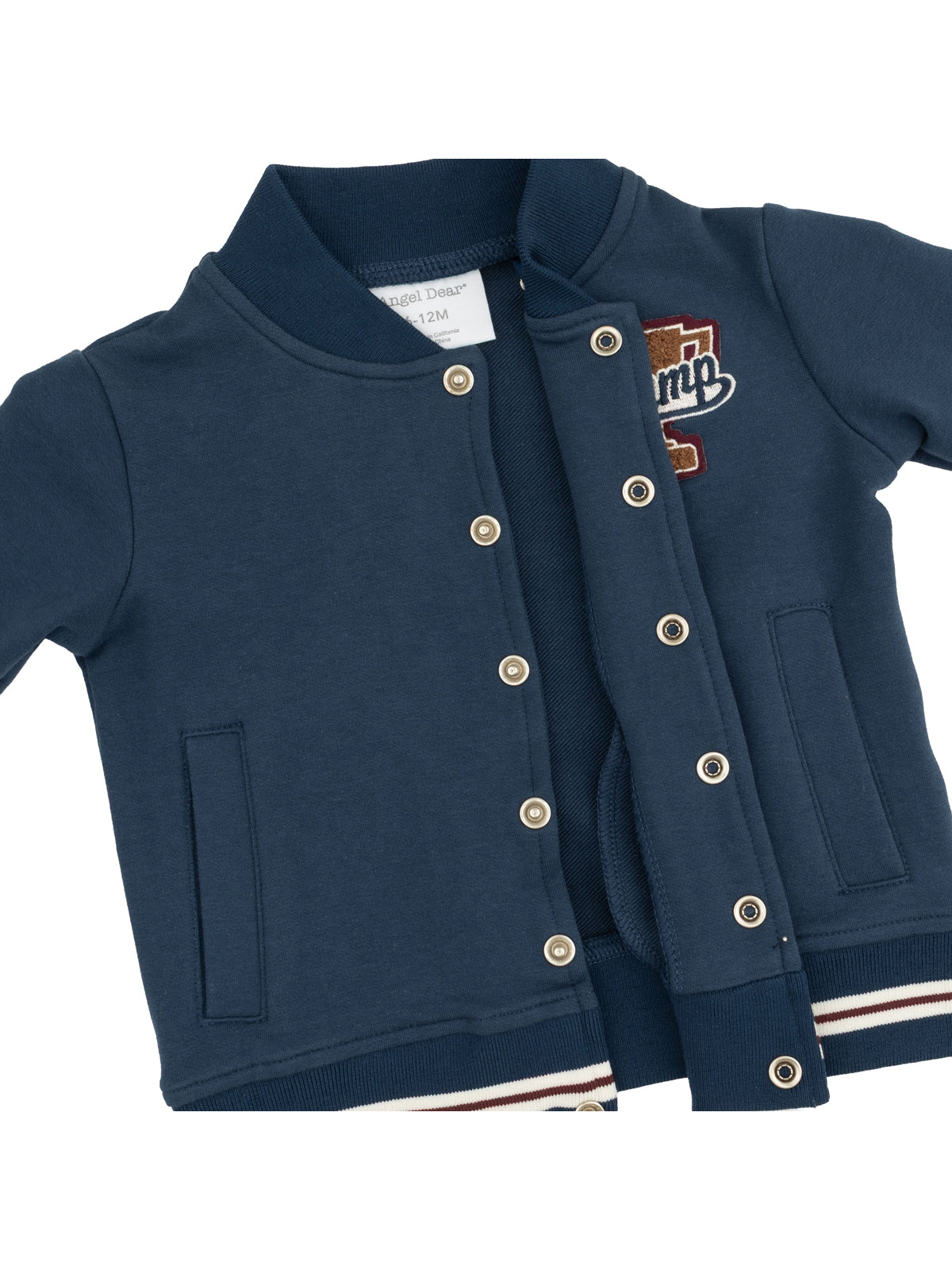 Navy blue toddler jacket with snap buttons and a playful patch design.