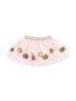 Pink skirt with floral and pumpkin embroidery, featuring a gold waistband. Ideal for casual or festive wear.