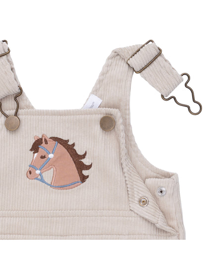 Beige corduroy overalls with a horse head embroidery detail on the front pocket.