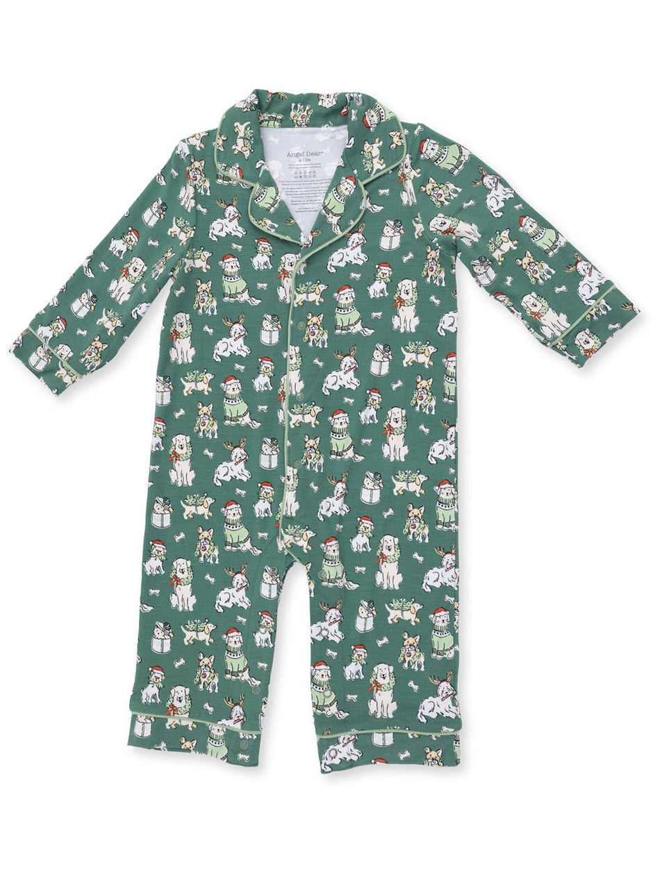 Green children's pajamas featuring playful dog graphics in festive attire. Perfect for cozy sleepwear.