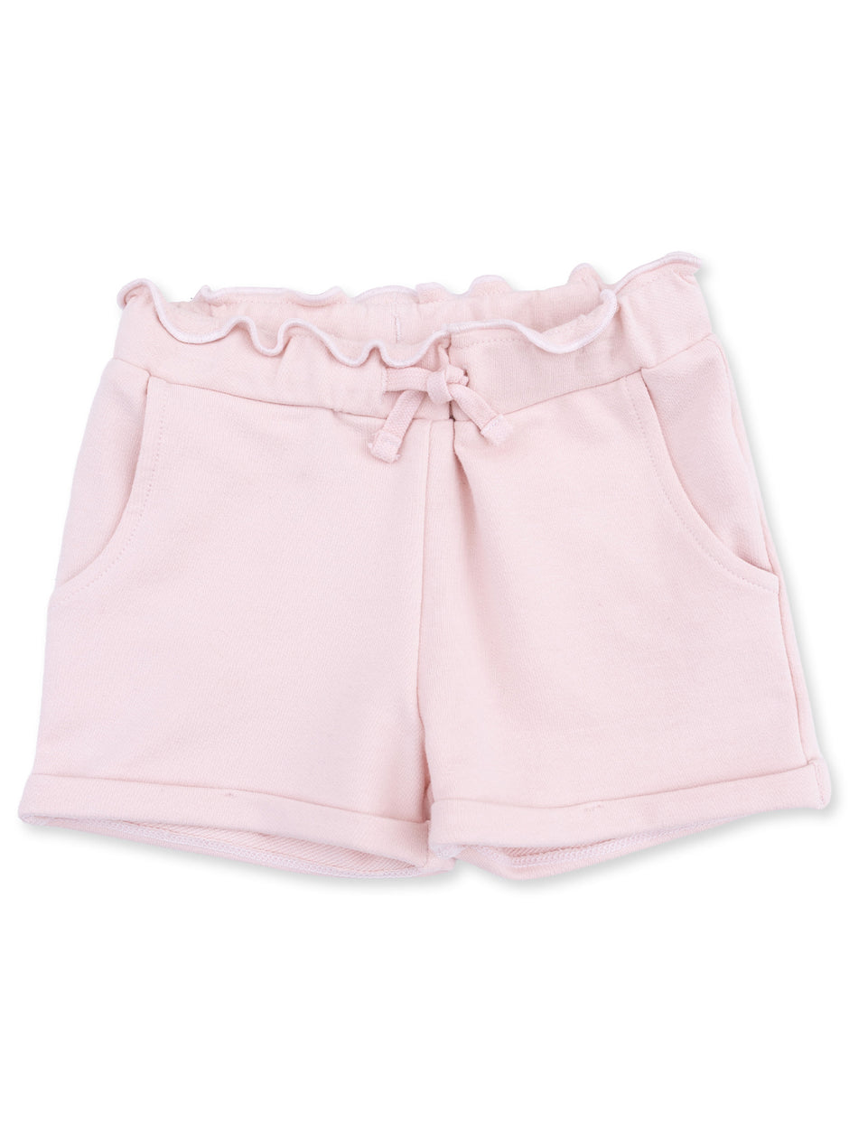 Light pink toddler shorts with ruffled waist and front pockets, made from soft cotton material.