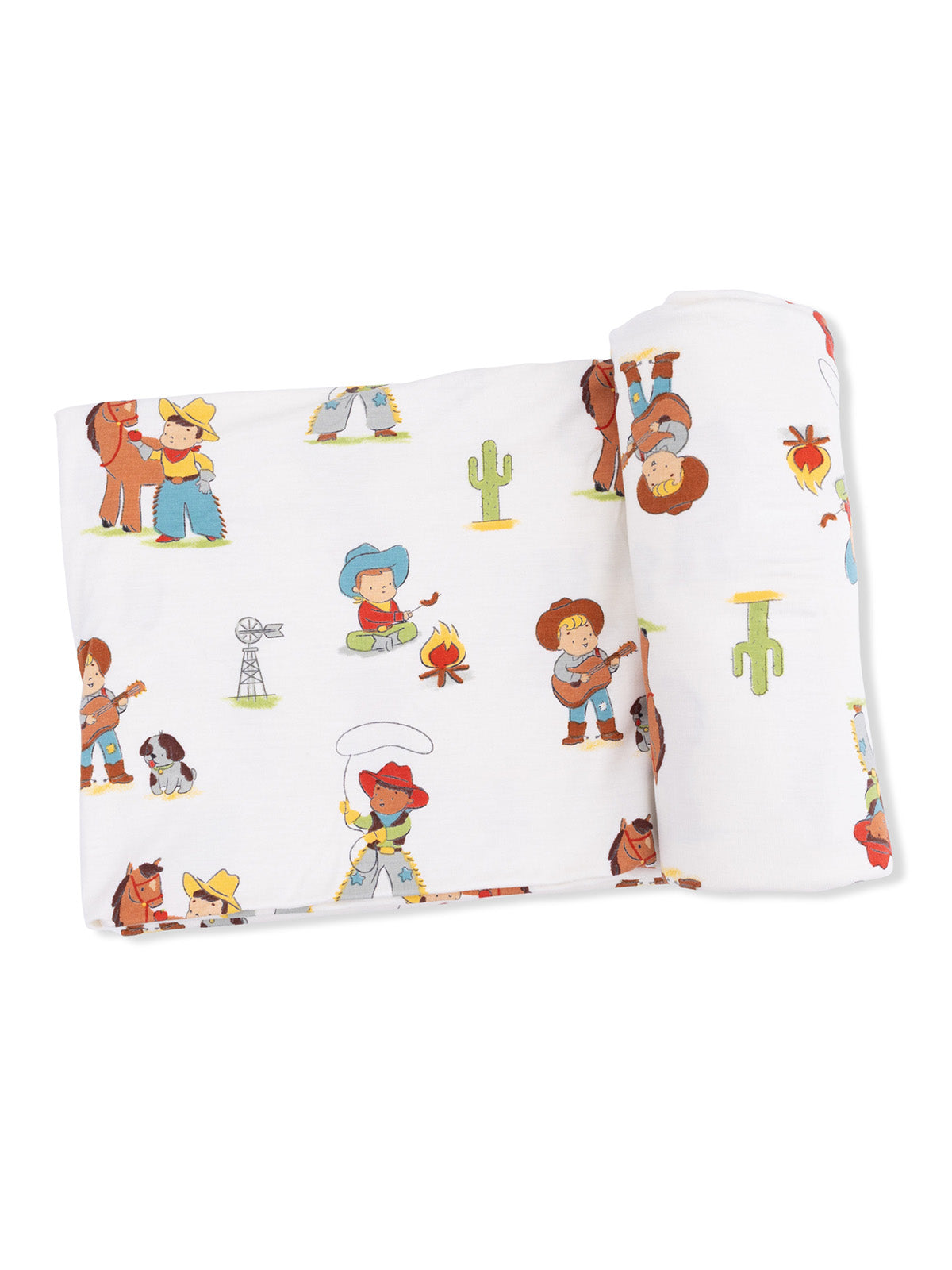 Cartoon cowboys and cacti pattern on a white background, rolled fabric showcasing playful design.
