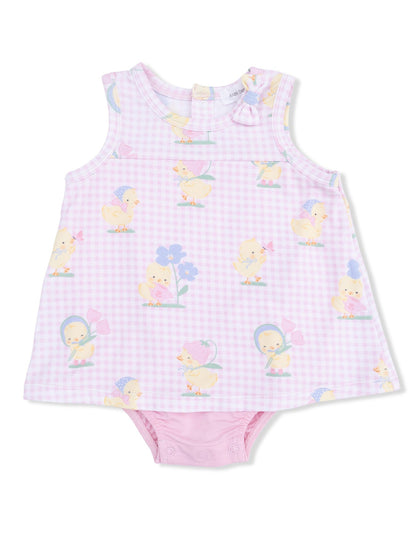Light pink sleeveless baby dress with cute chick and flower patterns, featuring a bow detail on the shoulder.