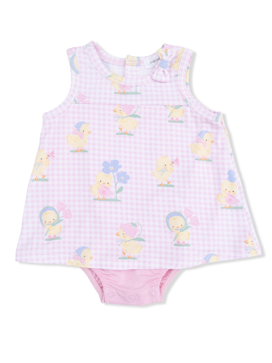 Light pink sleeveless baby dress with cute chick and flower patterns, featuring a bow detail on the shoulder.