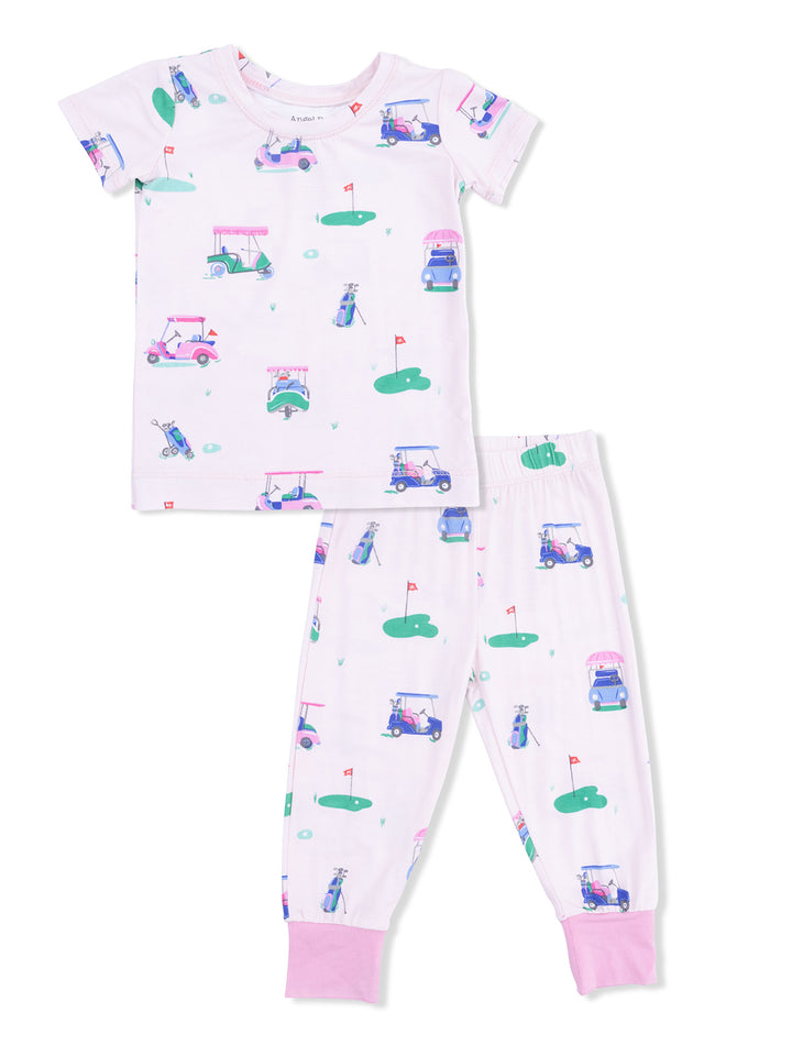 Girls' golf-themed pajama set with short sleeve top and pants, featuring colorful golf carts and accessories.