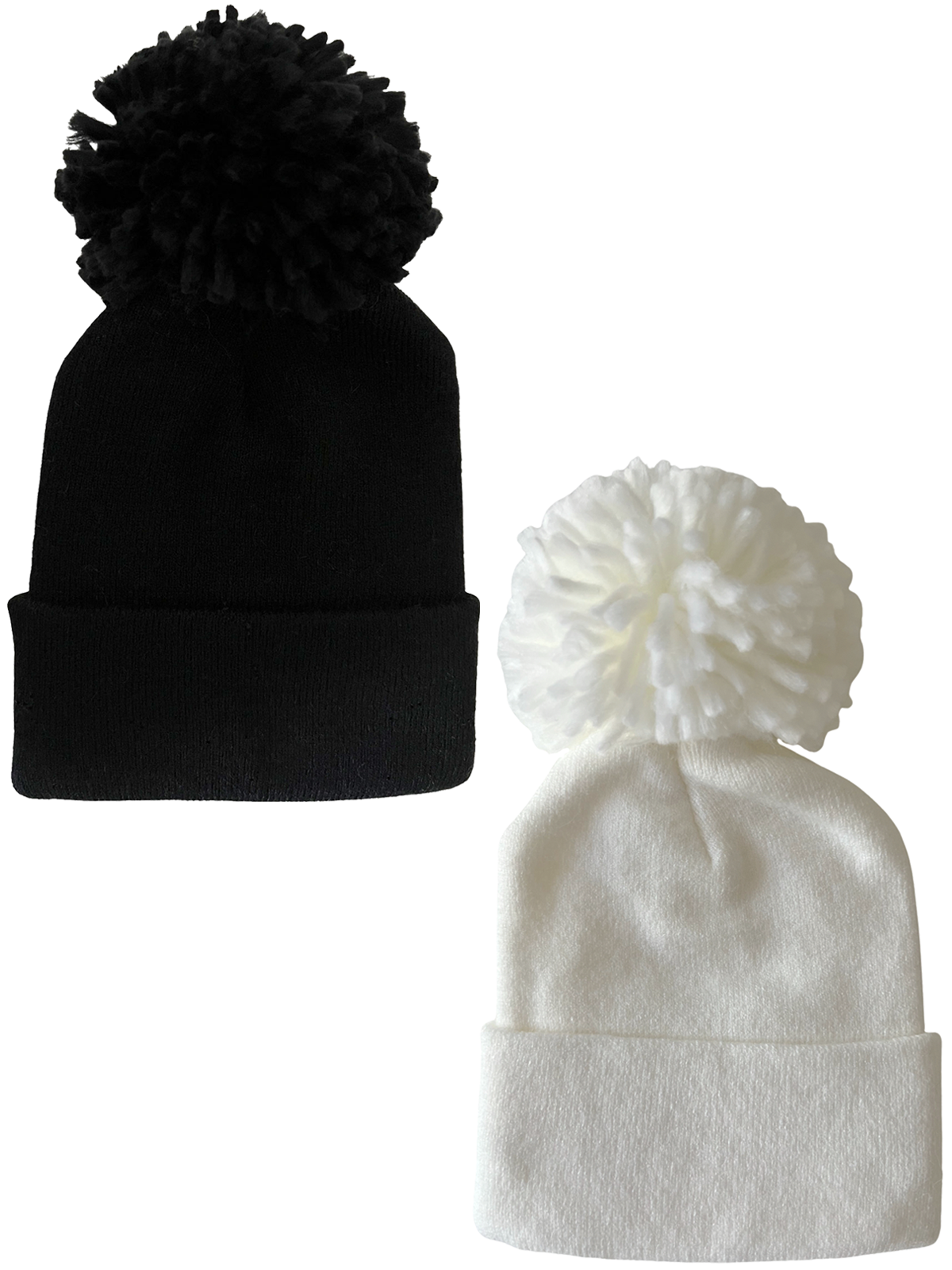 Black and white beanies with pom-poms, displayed side by side, showcasing their soft texture and stylish designs.
