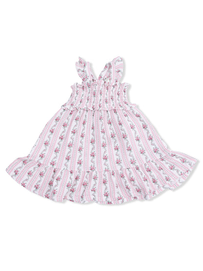 Girls' floral dress with pink stripes and ruffled straps, featuring a smocked bodice and flared skirt.