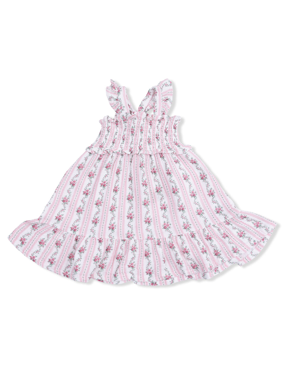 Floral-patterned girls' dress with ruffled straps and a flared skirt in pink and white. Perfect for summer wear.