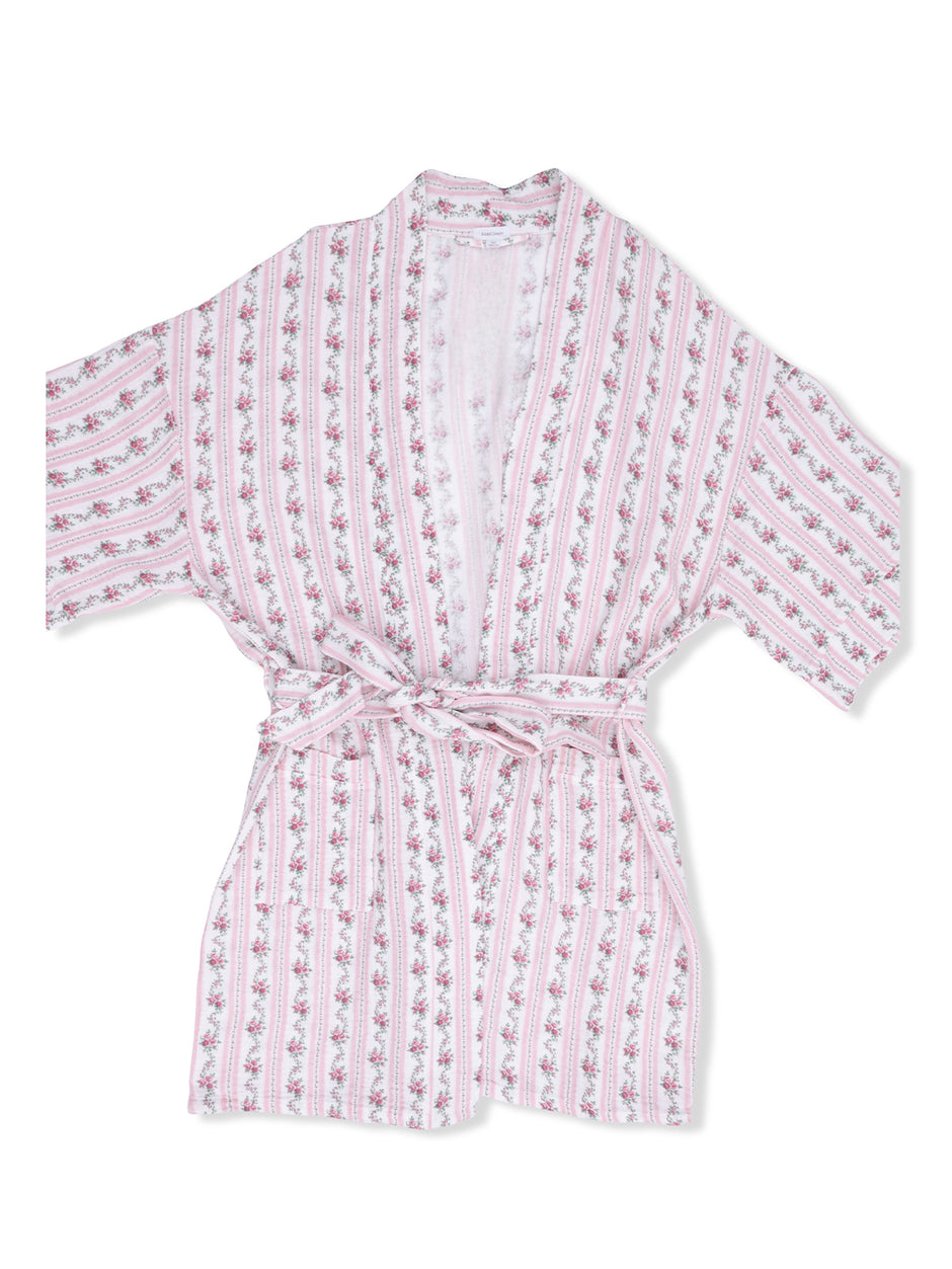 Floral-patterned pink and white robe with a tie closure and wide sleeves, laid flat on a white background.