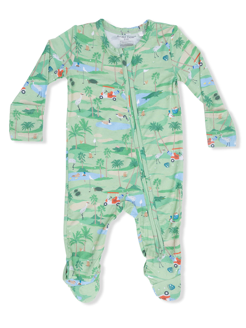 Green baby onesie featuring playful outdoor patterns with animals, palm trees, and vintage cars.