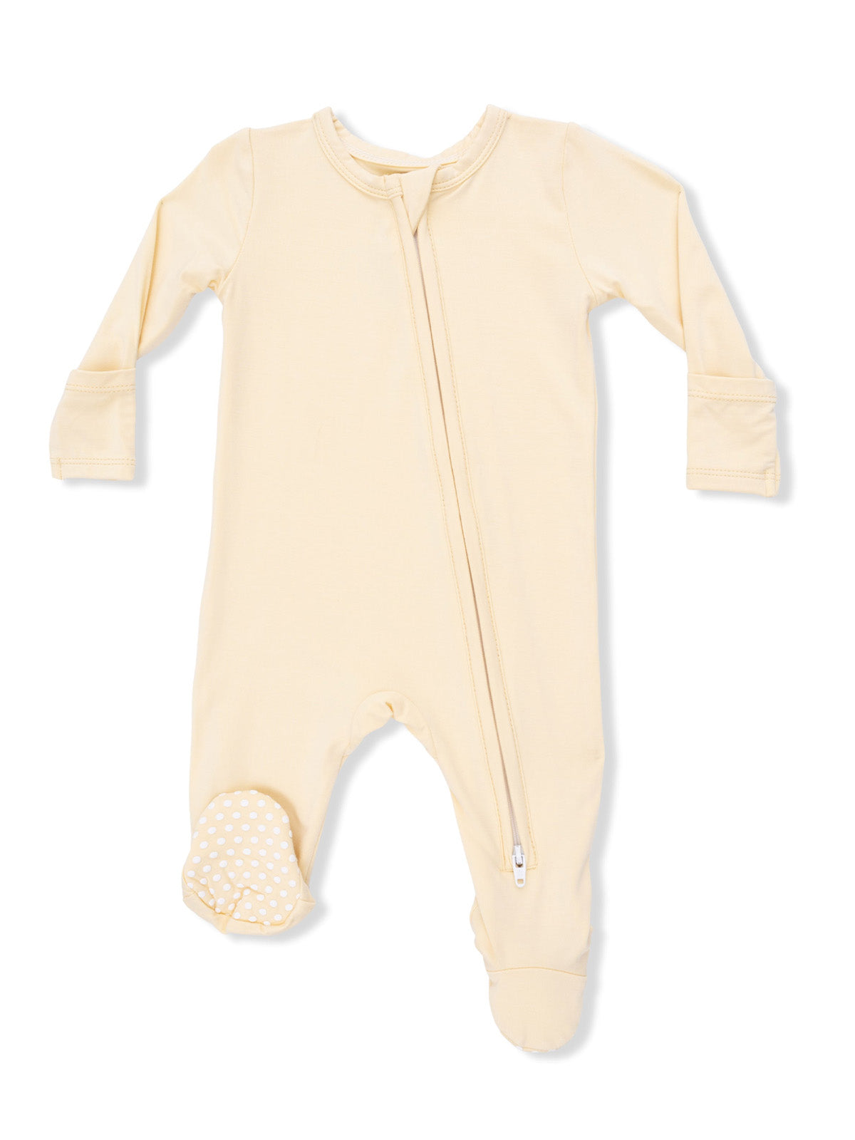 Light yellow baby onesie with a front zipper and polka dot footie detail.