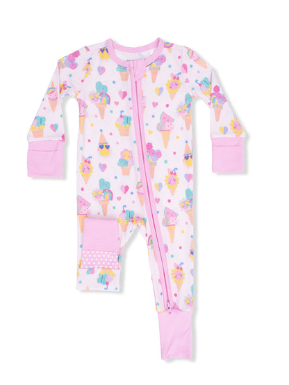 Pink children's onesie with ice cream and cupcake patterns, featuring a full front zipper and long sleeves.