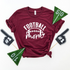 Maroon t-shirt with "FOOTBALL mom" text, surrounded by foam fingers and felt pennants for game day.